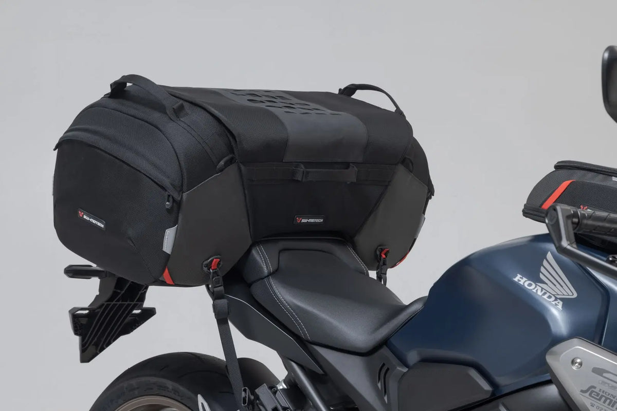 Bolsa trasera PRO Travelbag 1680D Nailon ballistic. Negro/Antracita. 65 l.